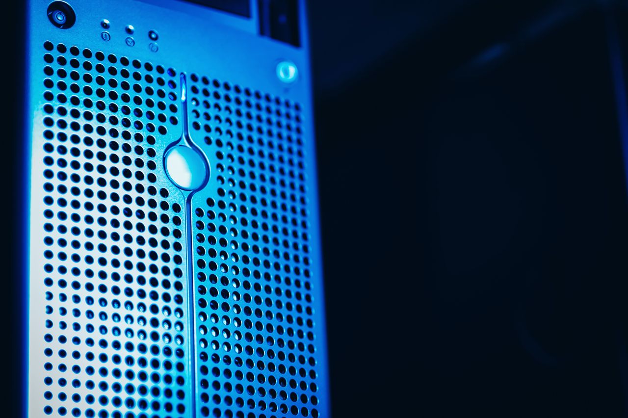 The Art of Drawing Readers In: Your attractive post title goes here Modern server rack with blue lighting in a secure data center environment.