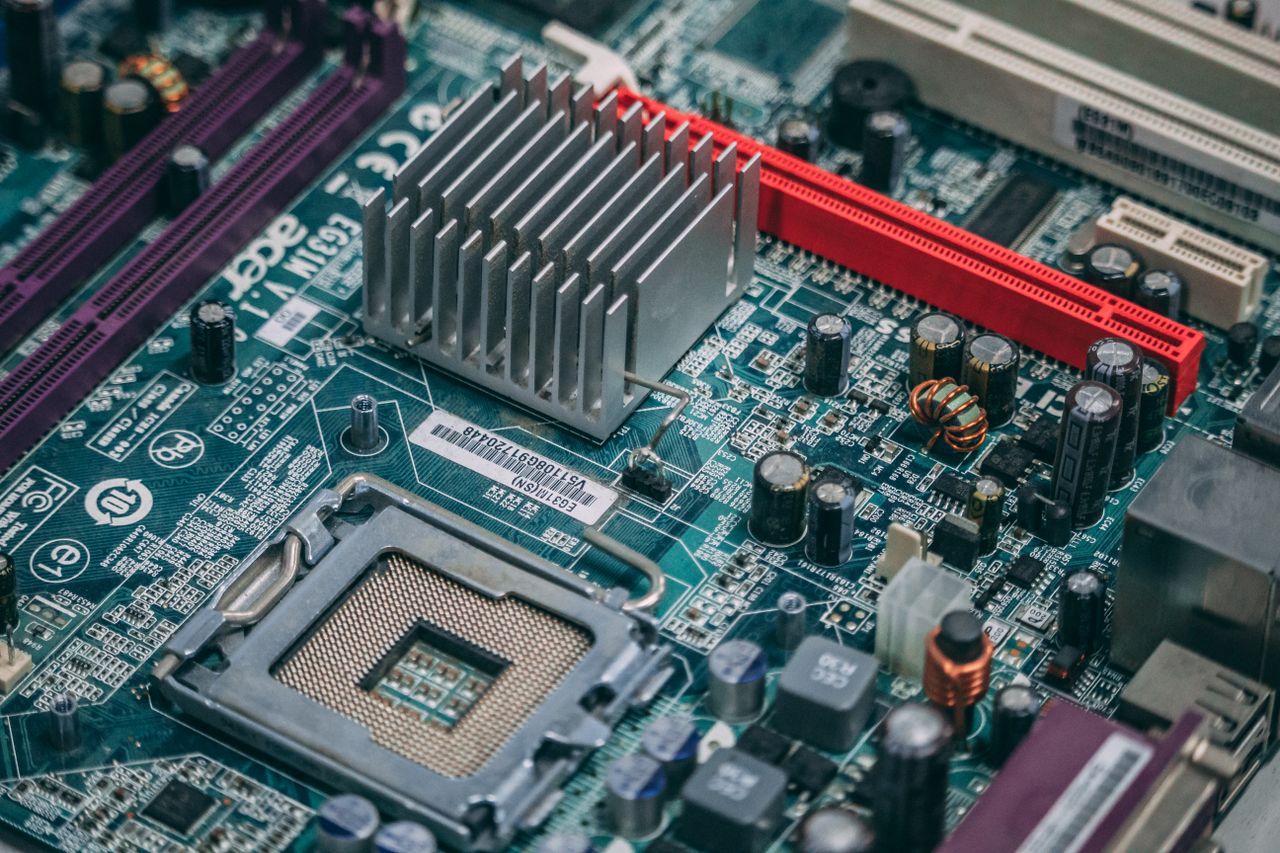 About Detailed image of a modern computer motherboard showcasing components and circuits.